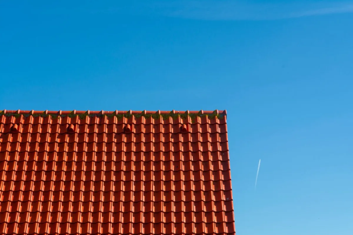 Tile roof gable in full sun, the kind of exposure that sets roof life in Pocatello, ID